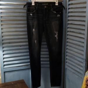 Express dark wash skinny jeans